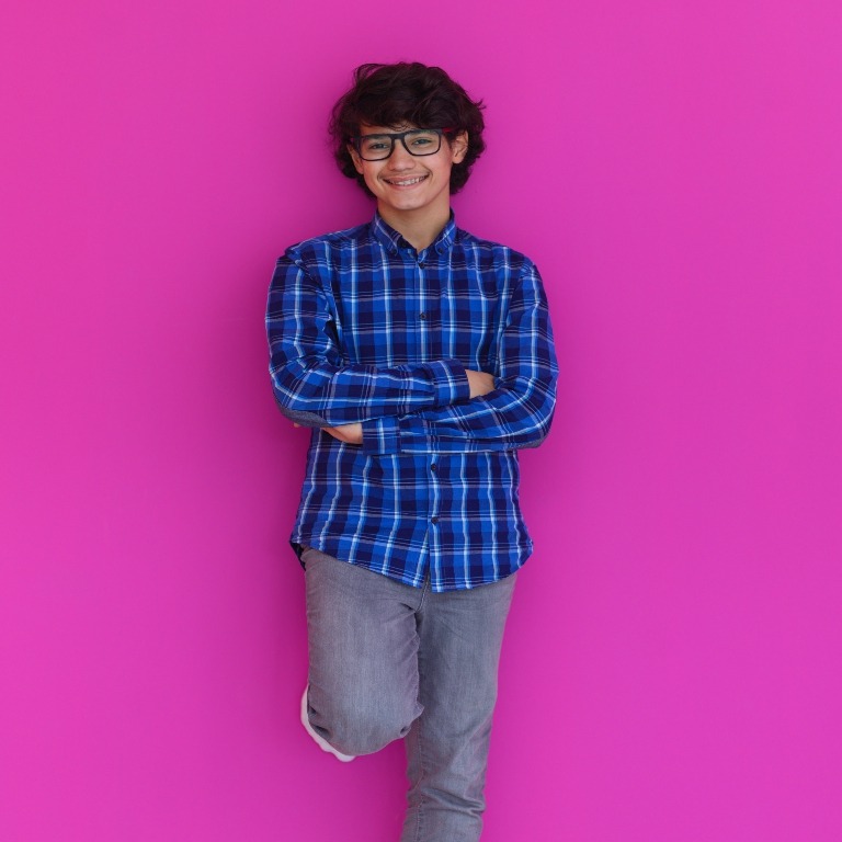 9th grade boy pink background